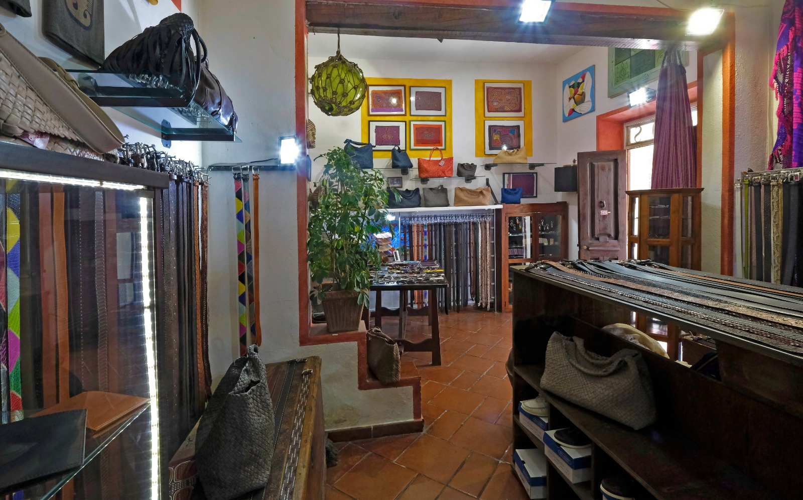 Interior of Rey Leather Workshop with displayed leather goods.